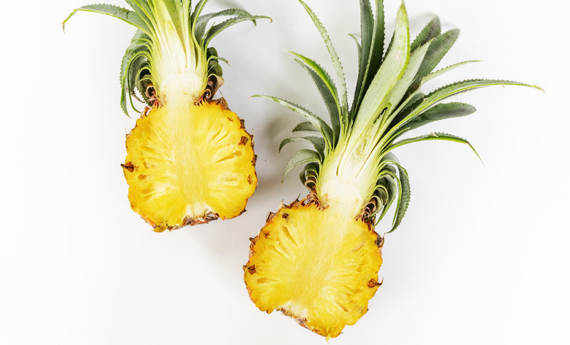 Fresh pineapple isolated on white