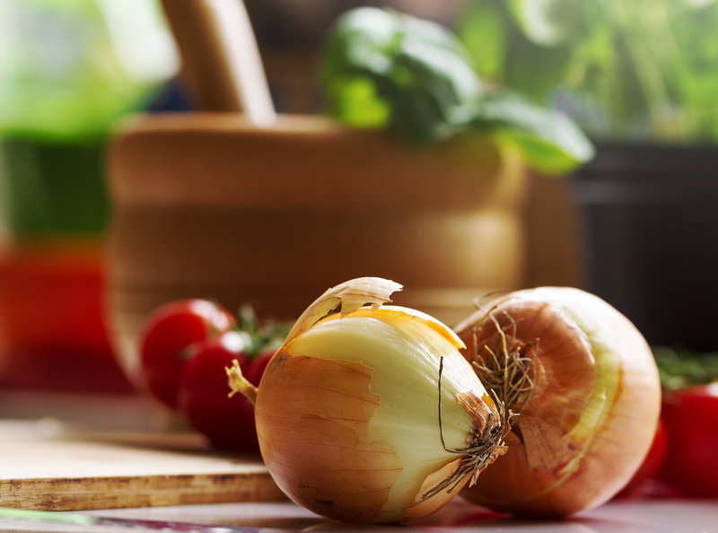 Kitchen Background Cooking Food Concept. Onion on Table. Vegetab