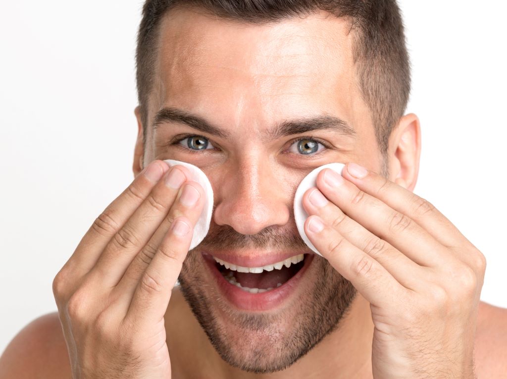 man using fruit toner