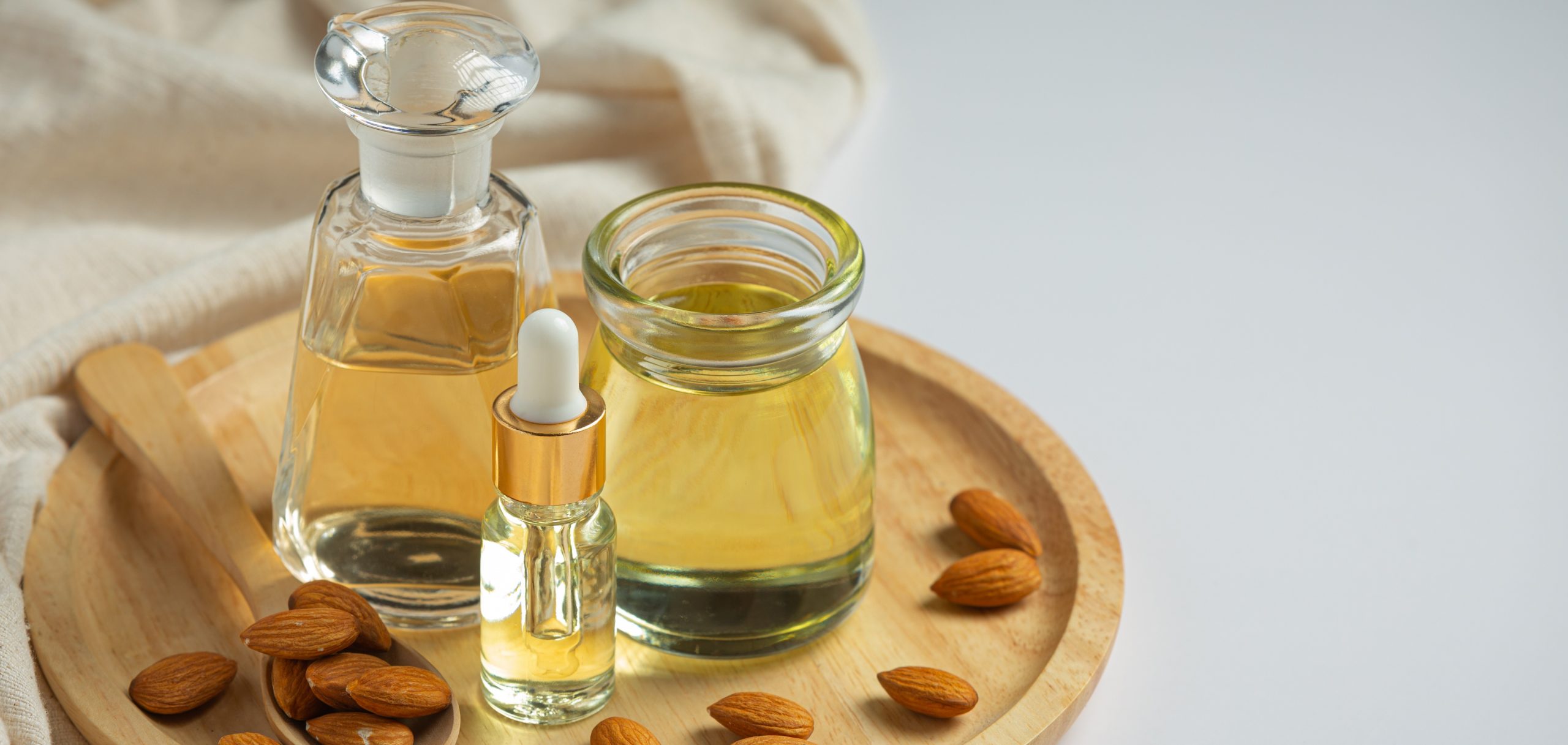 almond-oil-bottle-white-background almond oil